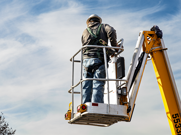 Worker Using A Fall Protection System On An Aerial Lift